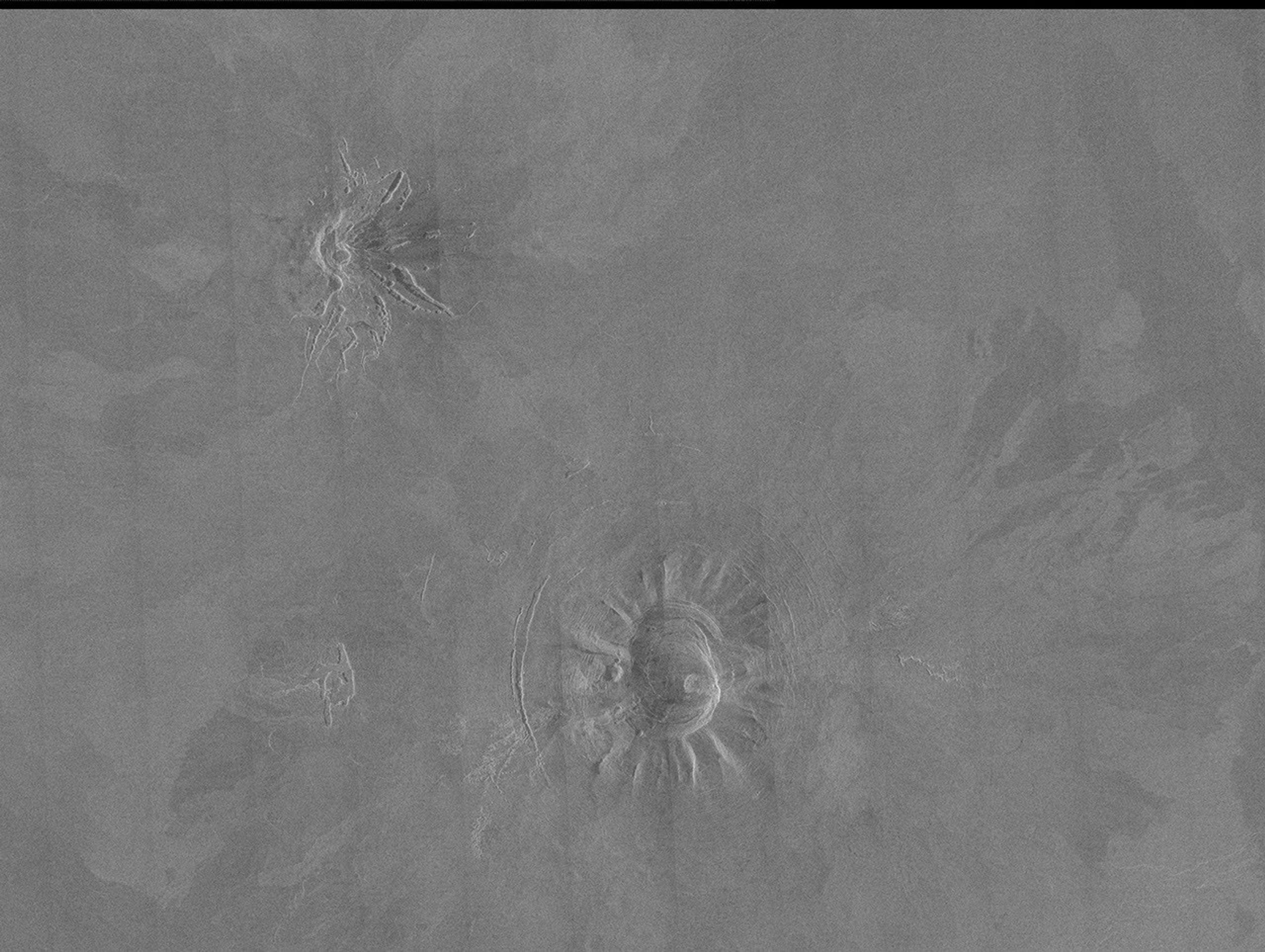 Two unusual volcanic domes are shown in this full-resolution mosaic obtained by NASA's Magellan spacecraft.