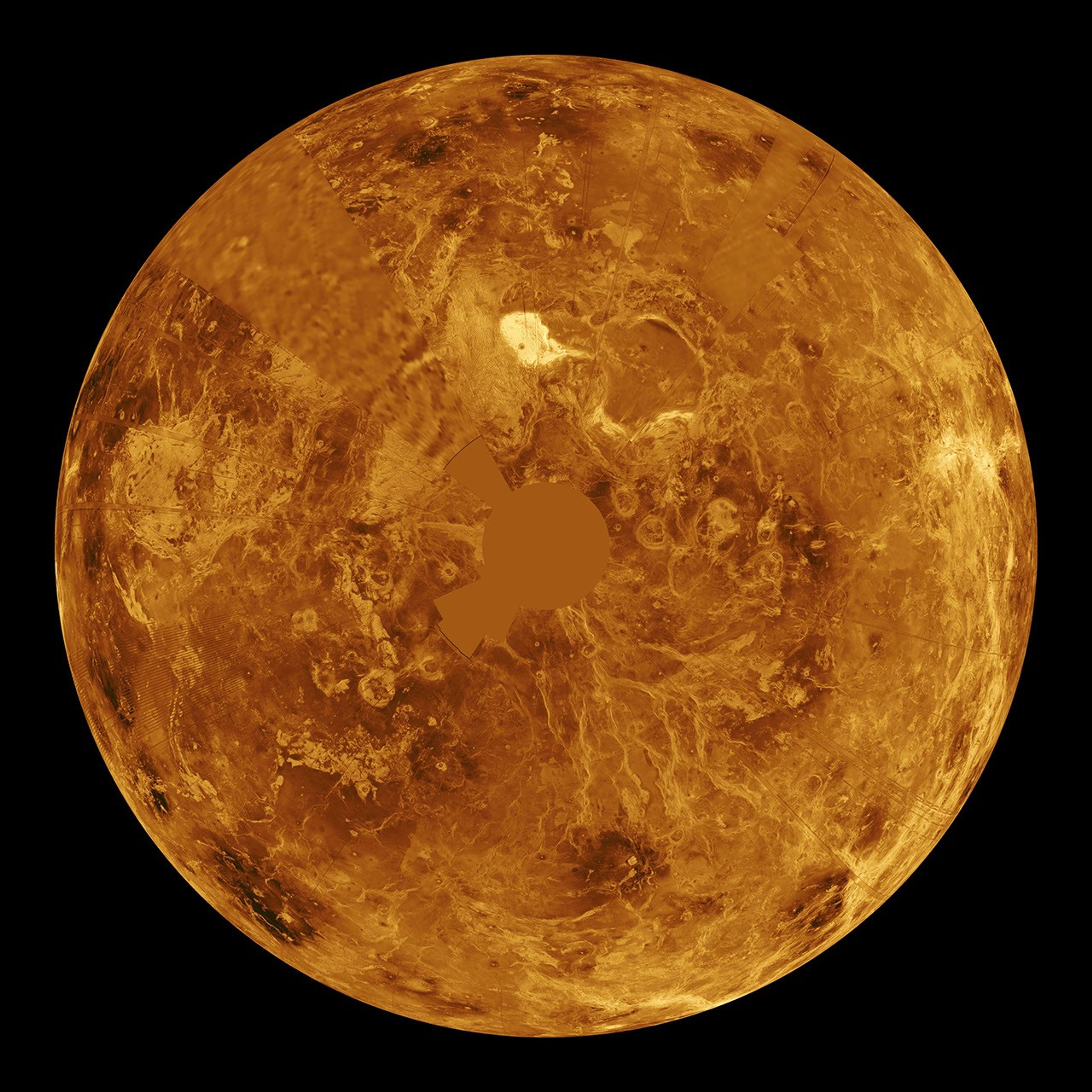 The northern hemisphere is displayed in this global view of the surface of Venus. NASA's Magellan synthetic aperture radar mosaics from the first cycle of Magellan mapping were mapped onto a computer-simulated globe to create this image.