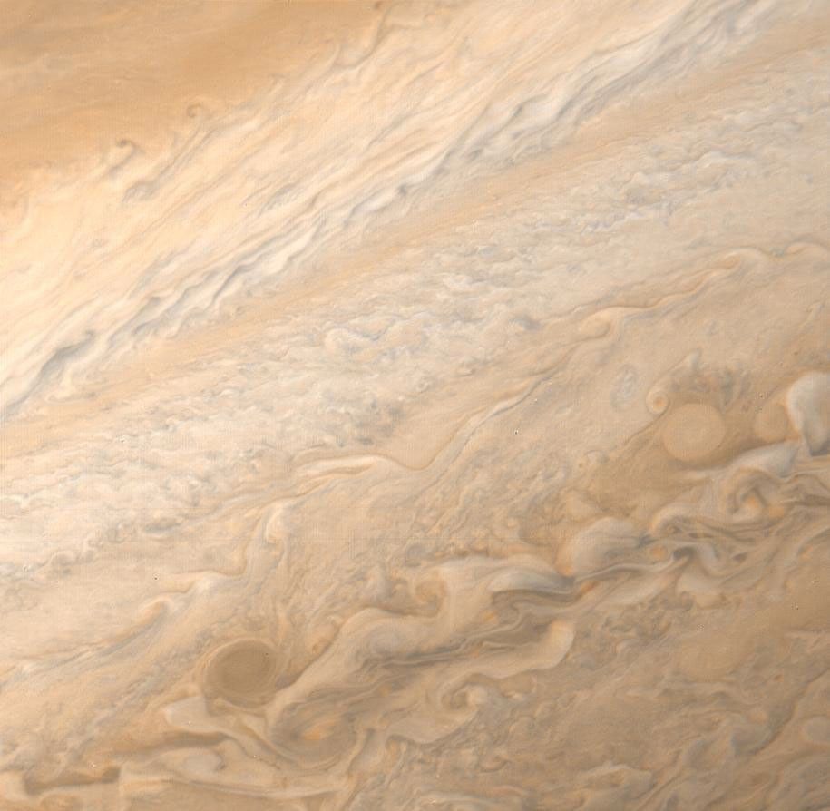 A high resolution image of the Jovian mid-latitudes taken by NASA's Voyager 1 spacecraft on March 2, 1979, shows distinctly differing characteristics of the planet's meteorology.