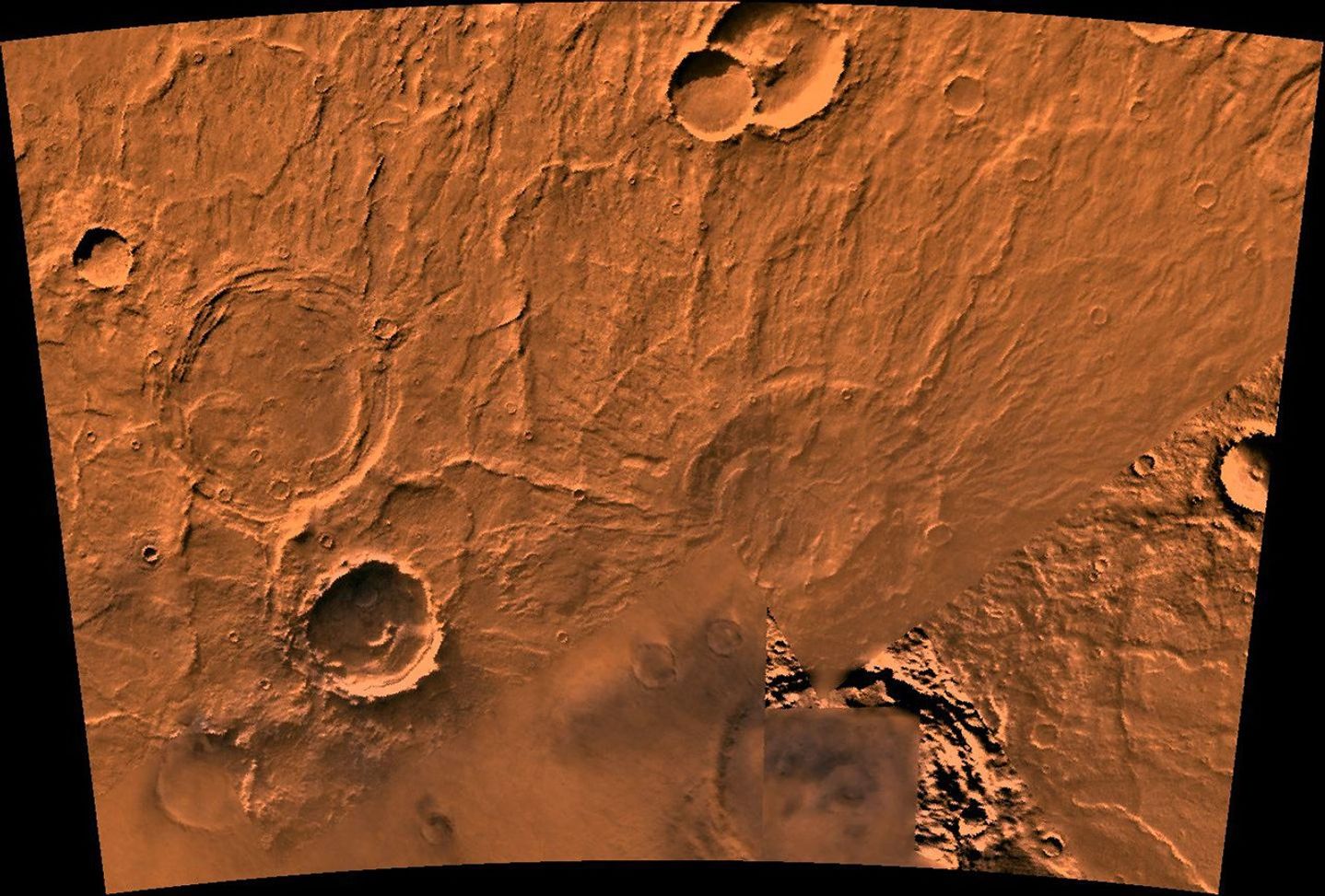 The Amphitrites Patera region of Mars. This scene shows several indistinct ring structures and radial ridges of an old volcano named Amphitrites Patera, as seen by NASA's Viking spacecraft.