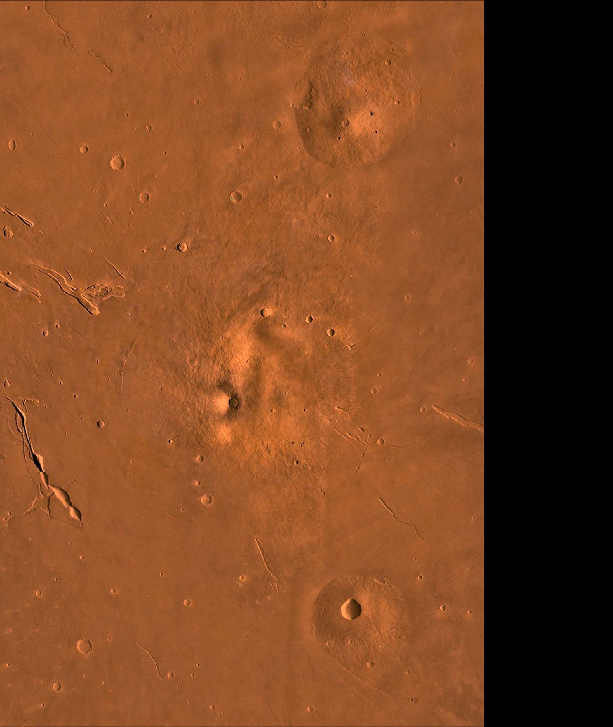 The Elysium Region of Mars; north toward top. This scene shows the Elysium Mons volcano (center), Hecates Tholus (to the north), Albor Tholus (to the south), and the depressions of Elysium Fossae, as seen by NASA's Viking spacecraft.