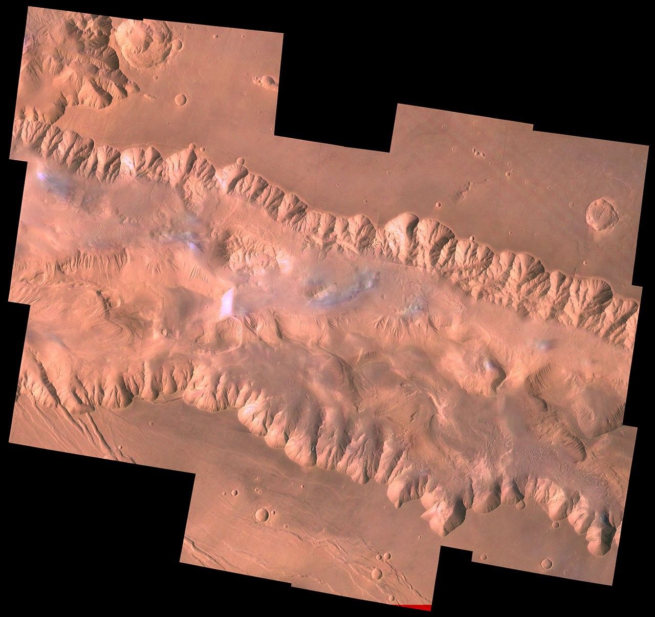 This view from NASA's Viking Orbiter 1 shows east Candor Chasma, one of the connected valleys of Valles Marineris. The Viking 1 craft landed on Mars in July of 1976.