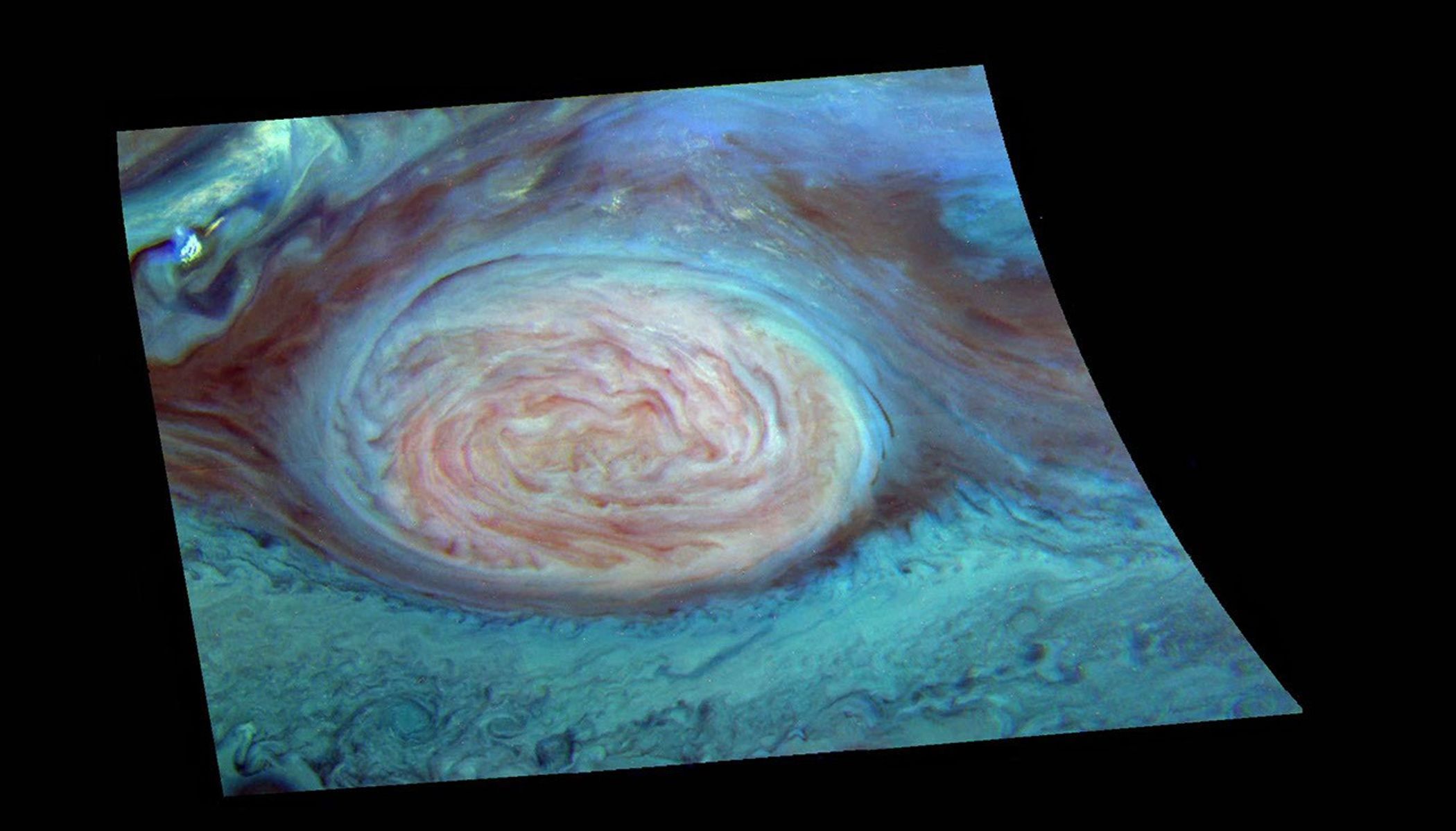 False color representation of Jupiter's Great Red Spot (GRS) taken by NASA's Galileo imaging system. The Great Red Spot appears pink and the surrounding region blue because of the particular color coding used in this representation.