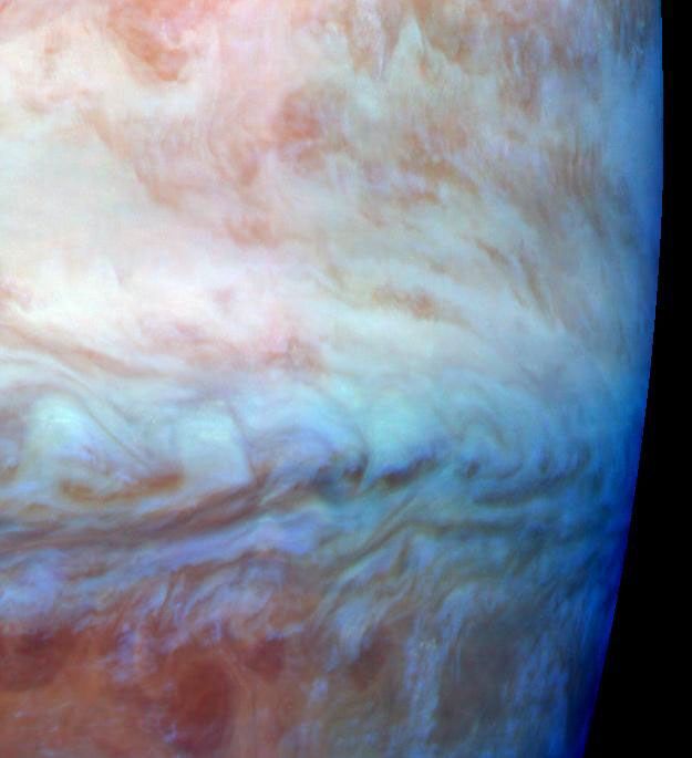 This false color mosaic shows a belt-zone boundary near Jupiter's equator. The images that make up the four quadrants of this mosaic were taken within a few minutes of each other. These images were taken on Nov. 5, 1996 by NASA's Galileo orbiter.