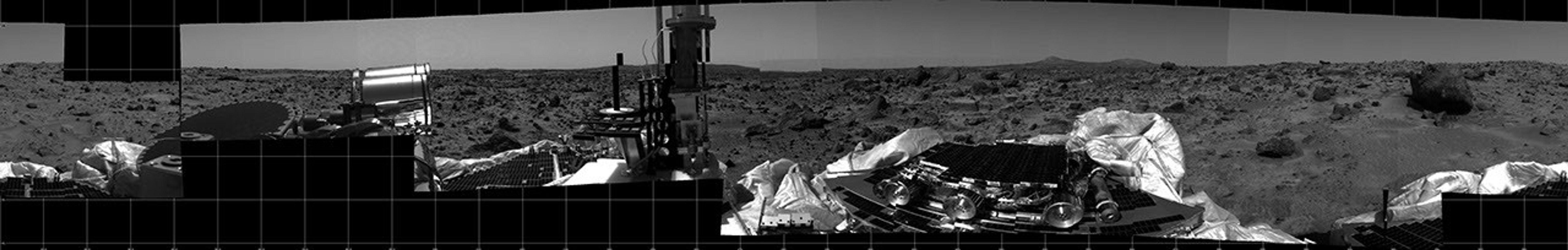 This photomosaic was taken by NASA's Imager for Mars Pathfinder (IMP) camera on July 4, 1997 between 4:00-4:30 p.m. PDT. The foreground is dominated by the lander, newly renamed the Sagan Memorial Station after the late Dr. Carl Sagan.