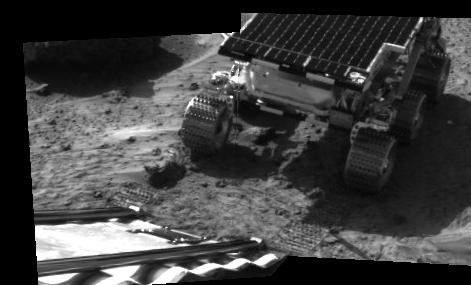 This picture taken by the IMP (Imager for Mars Pathfinder) aboard NASA's Mars Pathfinder spacecraft depicts the rover Sojourner's position after driving onto the Martian surface in 1997.