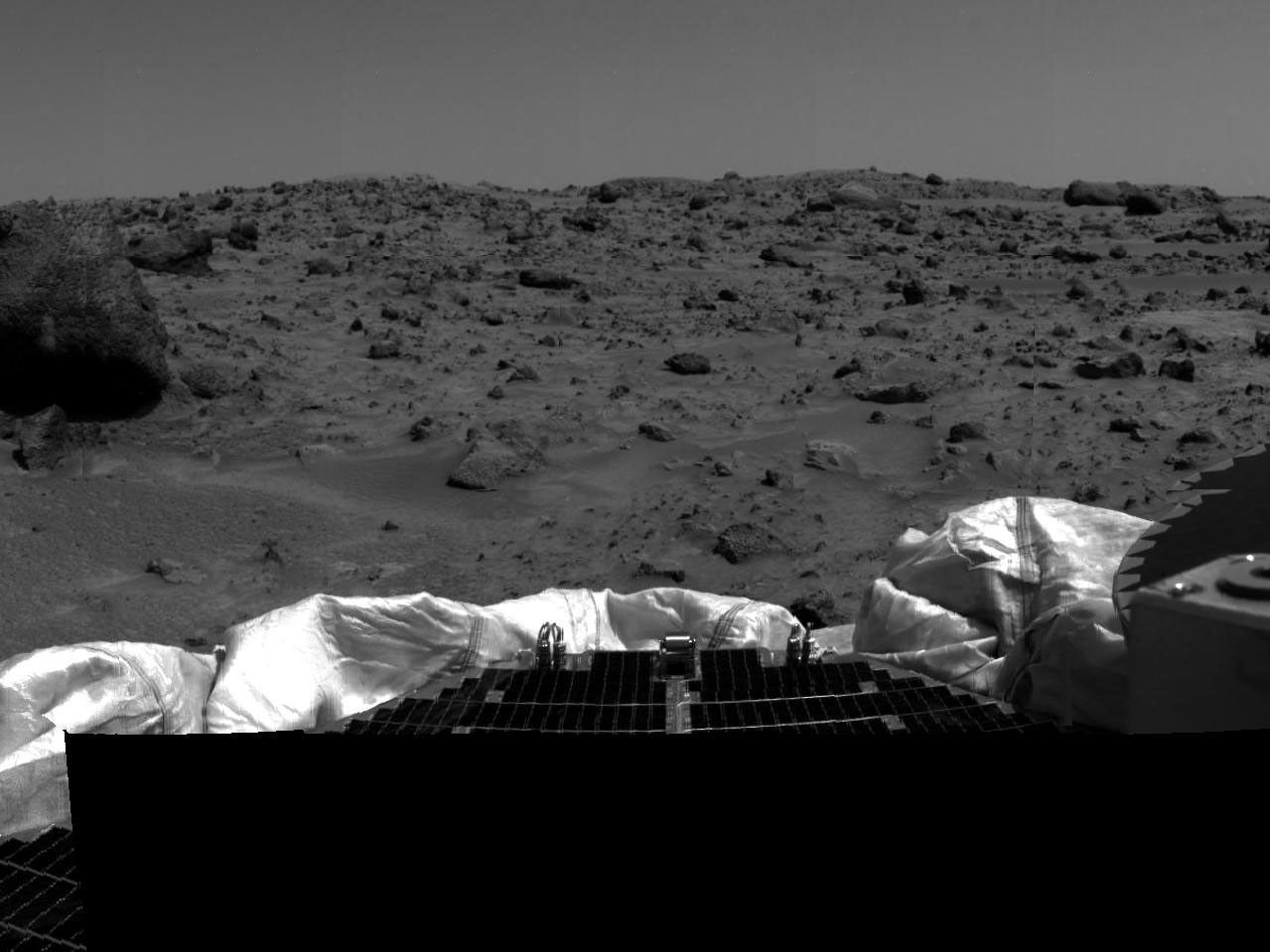 The left portion of this image, taken by the Imager for NASAs Mars Pathfinder (IMP) on July 5, 1997, Sol 2, shows a portion of the large rock nicknamed 'Yogi.'