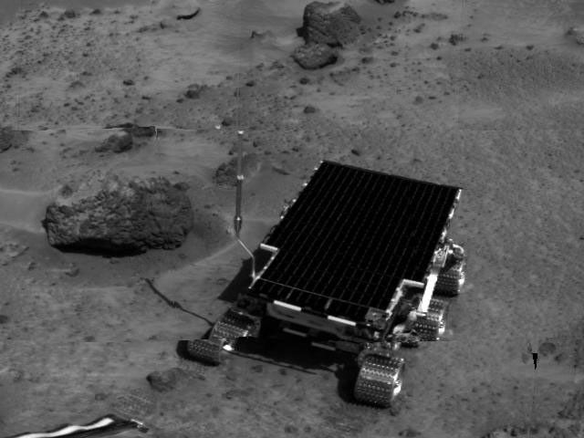 Sojourner is visible in this image, one of the first taken by NASA's deployed Imager for Mars Pathfinder (IMP) on July 7, 1997.