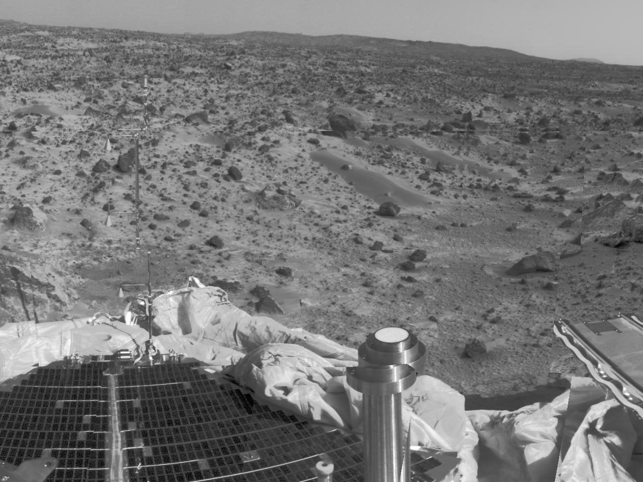 Mars Pathfinder's forward rover ramp can be seen successfully unfurled in this color image, taken by NASA's Imager for Mars Pathfinder (IMP) on July 7, 1997.