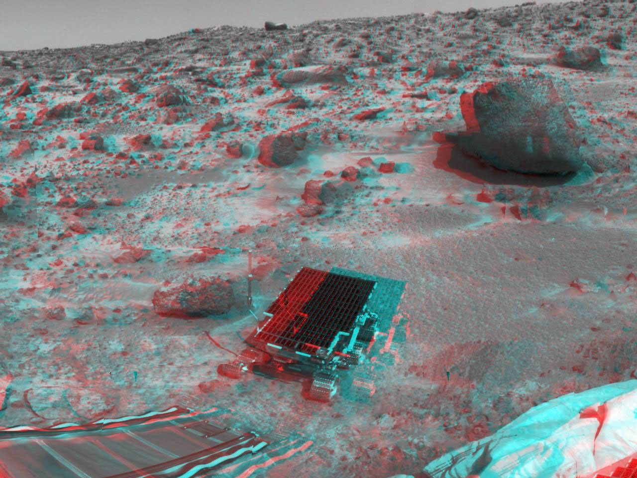 This area of terrain near the Sagan Memorial Station was taken by NASA's Mars Pathfinder. The curved rock dubbed 'Couch.' 3D glasses are necessary to identify surface detail.
