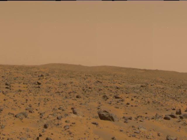 The crater dubbed 'Big Crater,' approximately 2200 meters (7200 feet) away was imaged by NASA's Imager for Mars Pathfinder (IMP) as part of a 360-degree color panorama, taken over sols 8, 9 and 10. Sol 1 began on July 4, 1997.