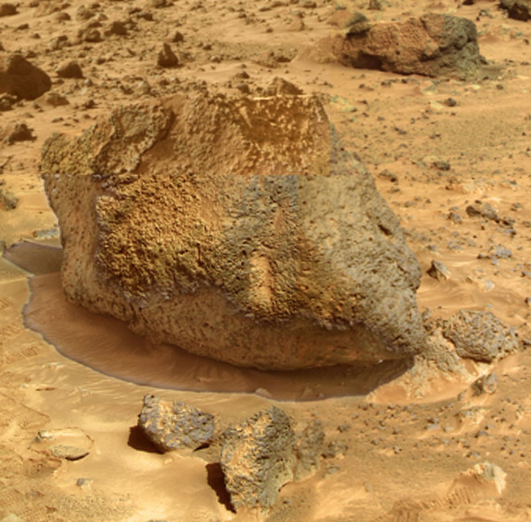 'Yogi' is a meter-size rock about 5 meters northwest of NASA's Mars Pathfinder lander and was the second rock visited by the Sojourner Rover's alpha proton X-ray spectrometer (APXS) instrument. Sol 1 began on July 4, 1997.