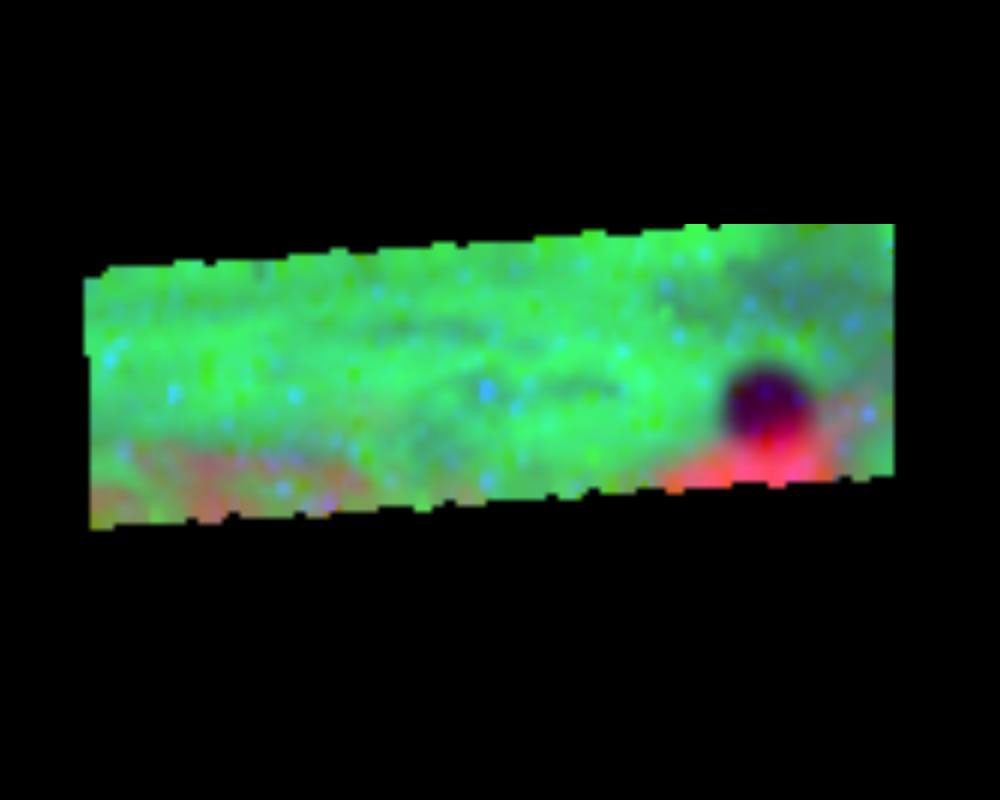 During the G7 encounter, NASA's Galileo spacecraft observed the shadow of Europa on the clouds of Jupiter during Galileo's fourth orbit. The bright spot in the clouds is an atmospheric hot spot.