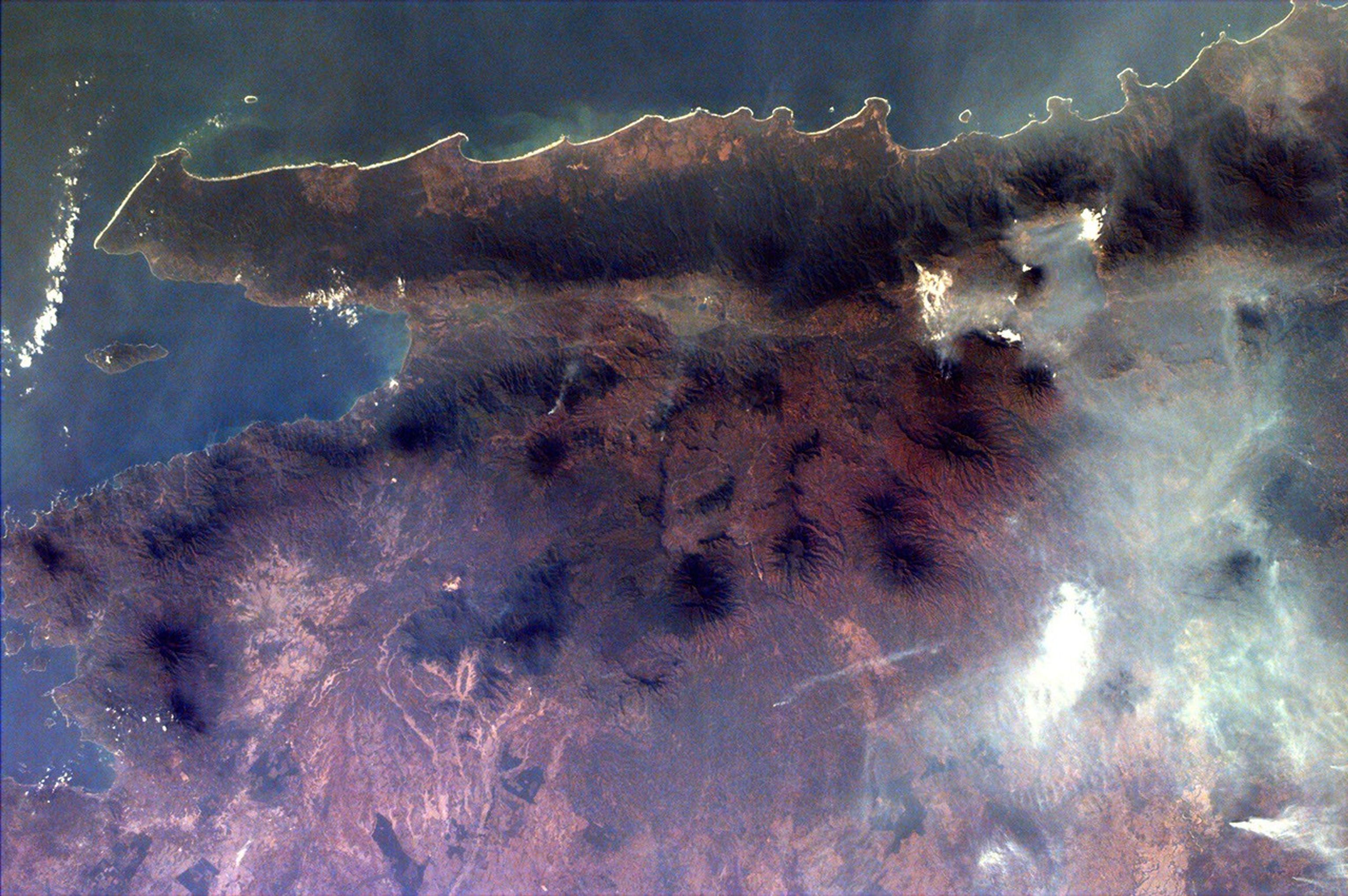 Middle school students across the country photographed the fires and smoke over southern Sumatra from a camera aboard the Space Shuttle Atlantis September 27, 1997.