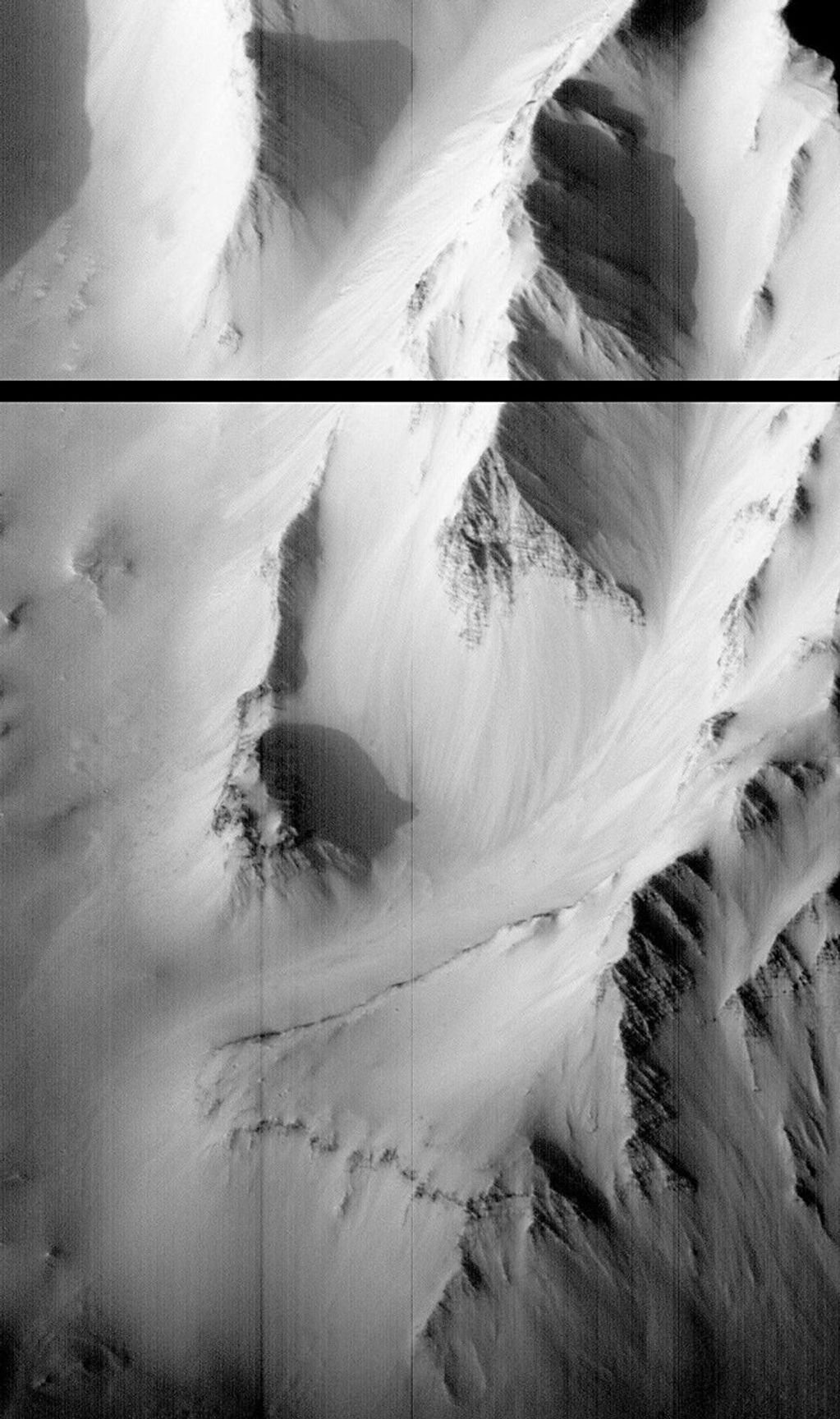 NASA's Mars Global Surveyor captured this image of a type of bedrock layering had never been seen before in Valles Marineris, Mars.