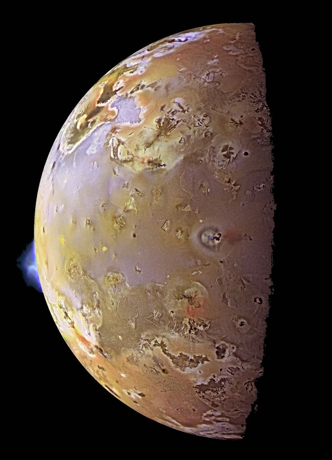This color image, acquired during NASA's Galileo ninth orbit (C9) around Jupiter, shows two volcanic plumes on Io. One plume was captured on the bright limb or edge of the moon, erupting over a caldera named Pillan Patera.