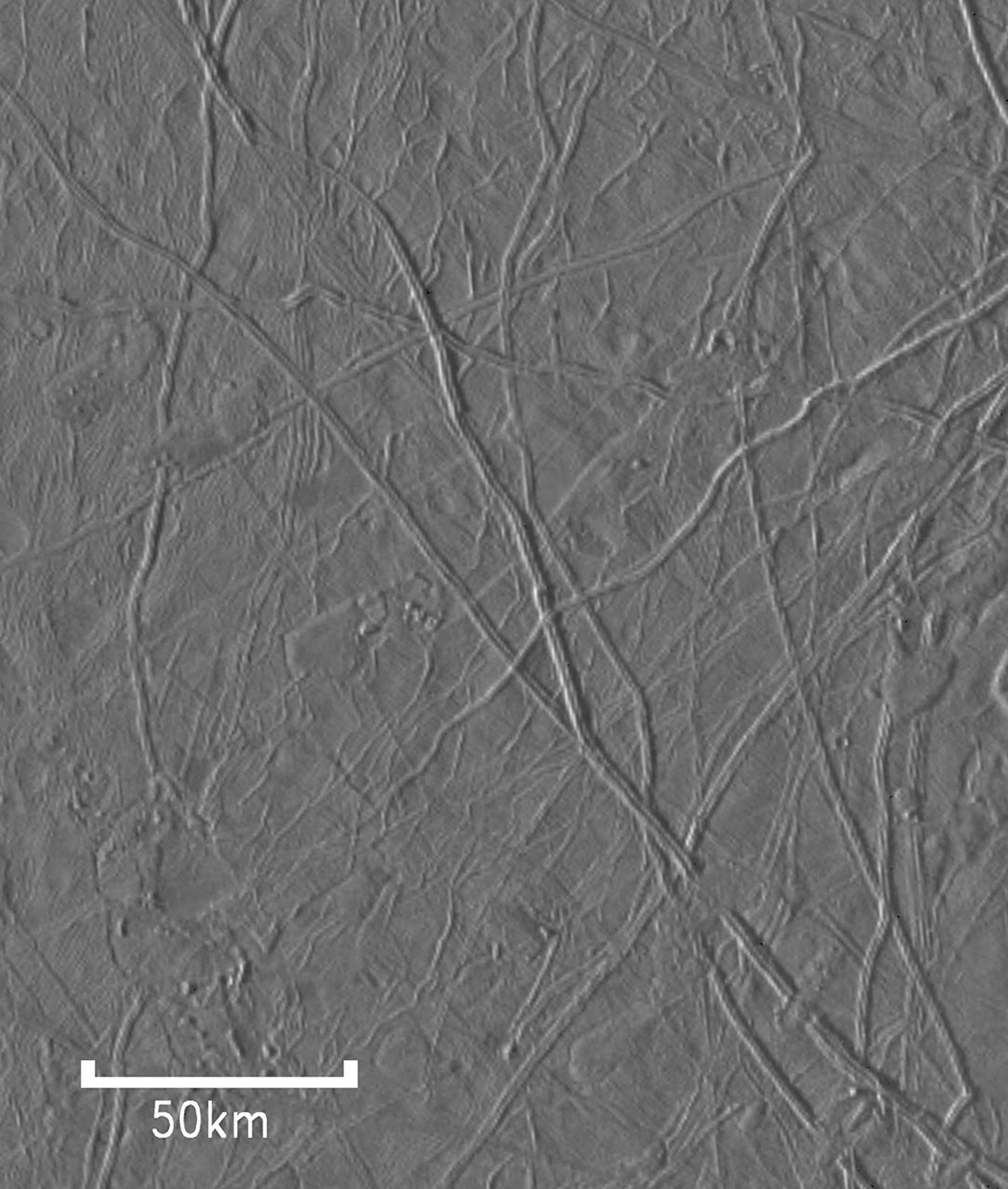 This image shows features on Jupiter's moon Europa that may be 'flows' from ice volcanoes. It was taken by NASA's Galileo spacecraft solid state imaging (CCD) system during its seventh orbit around Jupiter.