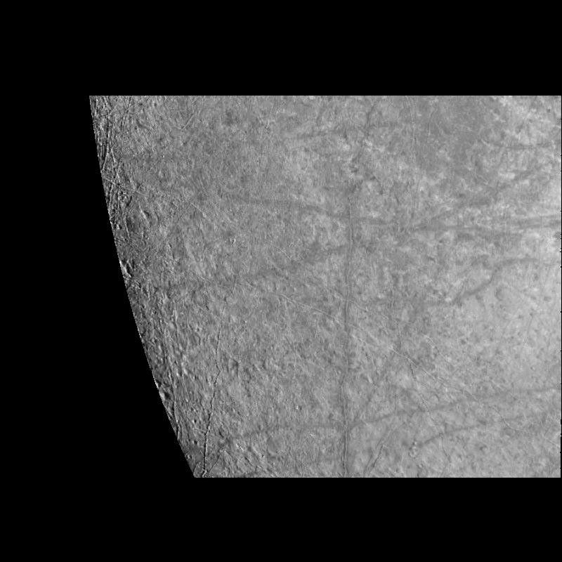 This image of Europa's surface was obtained by the Solid State Imaging (CCD) system on board NASA's Galileo spacecraft during its fourth orbit of Jupiter. Linear features with bright central stripes are seen to transect the surface of Europa.