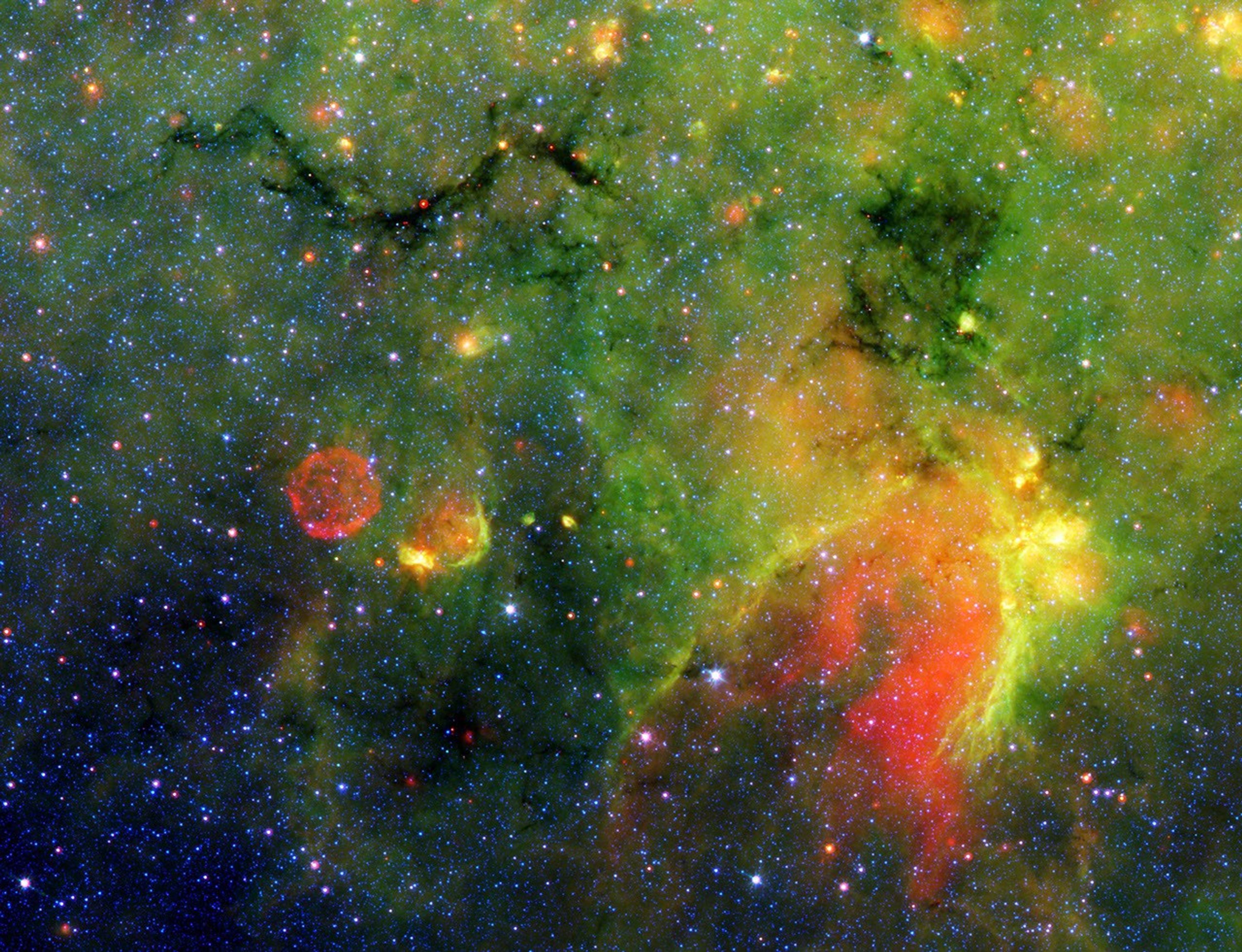 This infrared image from NASA's Spitzer Space Telescope shows what astronomers are referring to as a 'snake' (upper left) and its surrounding stormy environment.