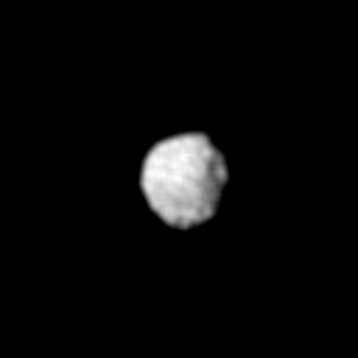 Several craters are seen on the surface of 1985U1, one of several small moons of Uranus discovered by NASA's Voyager 2. The spacecraft acquired this single image, the only close-up it obtained of any of the new moons, on Jan. 24, 1986.