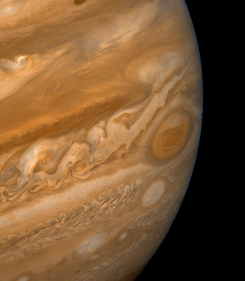This color composite made from NASA's Voyager 2 shows the Great Red Spot during the late Jovian afternoon. North of the Red Spot lies a curious darker section of the South Equatorial Belt (SEB), the belt in which the Red Spot is located.