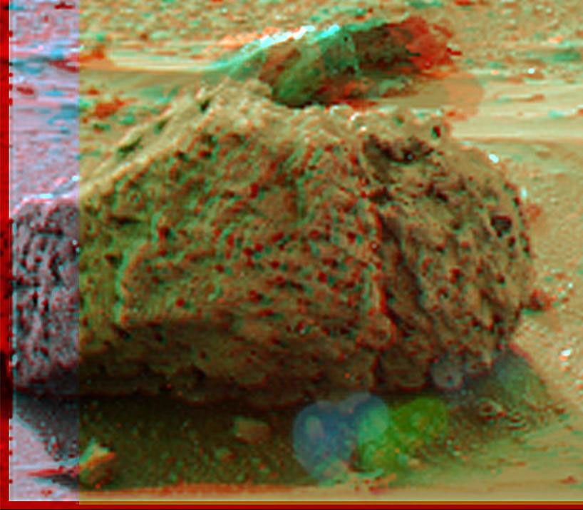 'Barnacle Bill' is a small rock immediately west-northwest of NASA's Mars Pathfinder lander and was the first rock visited by the rover Sojourner. 3D glasses are necessary to identify surface detail.