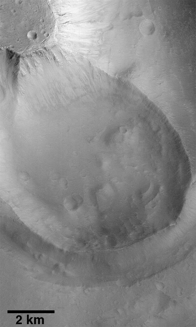 This image taken on June 4, 1998 by NASA's Mars Global Surveyor shows Kasei Vallis, a system of giant channels thought to have been carved by catastrophic floods that occurred more than a billion years ago.
