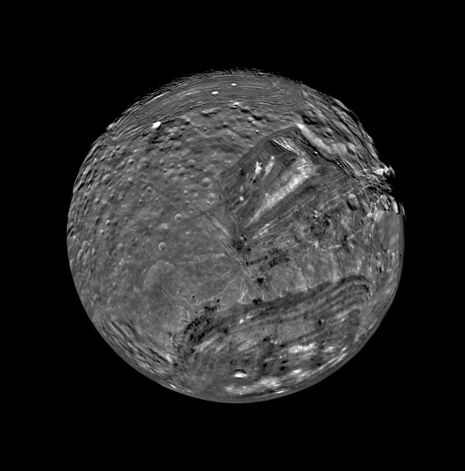Uranus' moon Miranda is shown in a computer-assembled mosaic of images obtained Jan. 24, 1986, by NASA's Voyager 2 spacecraft. Miranda is the innermost and smallest of the five major Uranian satellites,