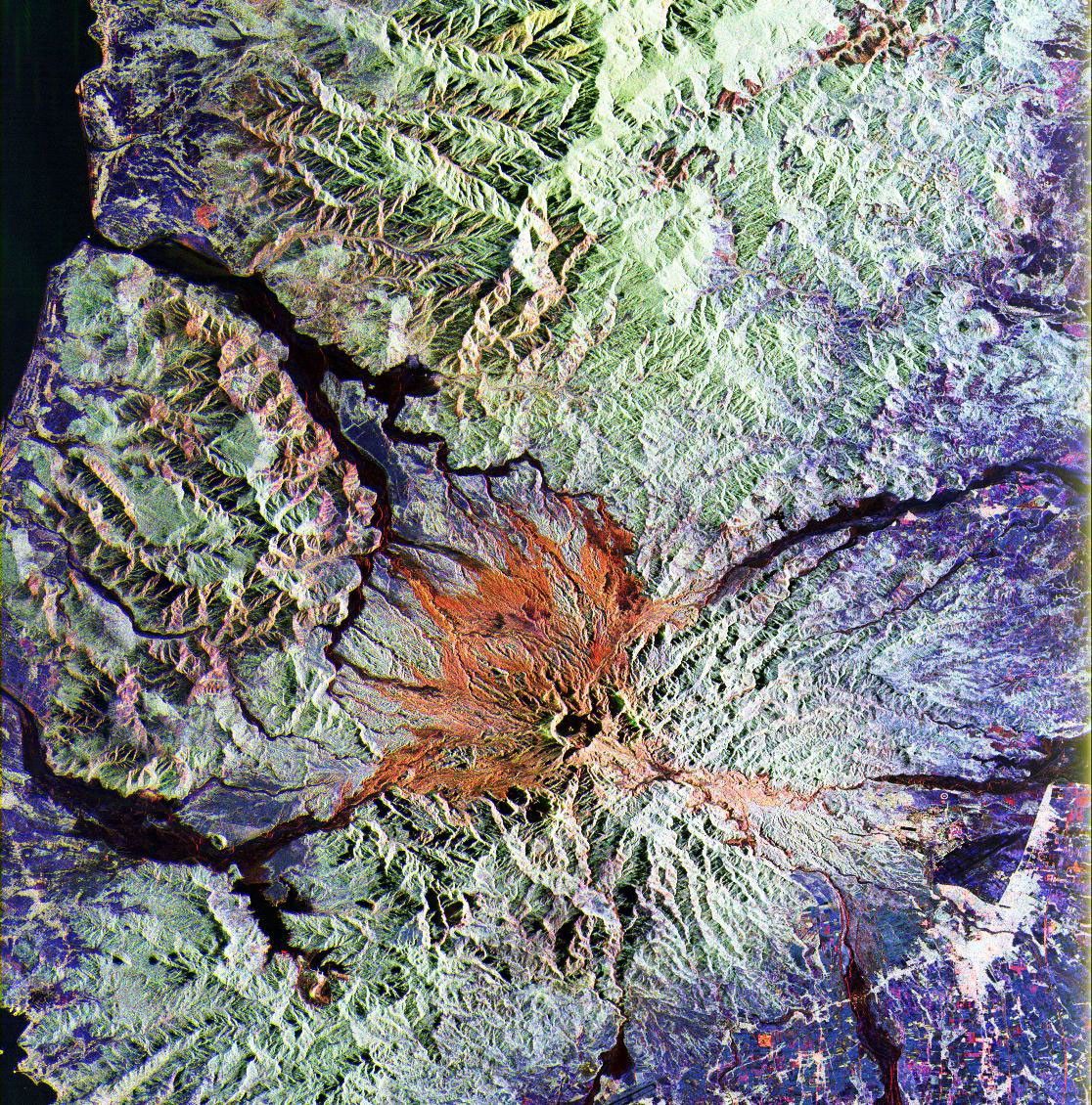 This is a false color image from NASA's Spaceborne Imaging Radar-C/X-band Synthetic Aperture Radar of the area around Mount Pinatubo in the Philippines, centered at about 15 degrees north latitude, 120.5 degrees east longitude.