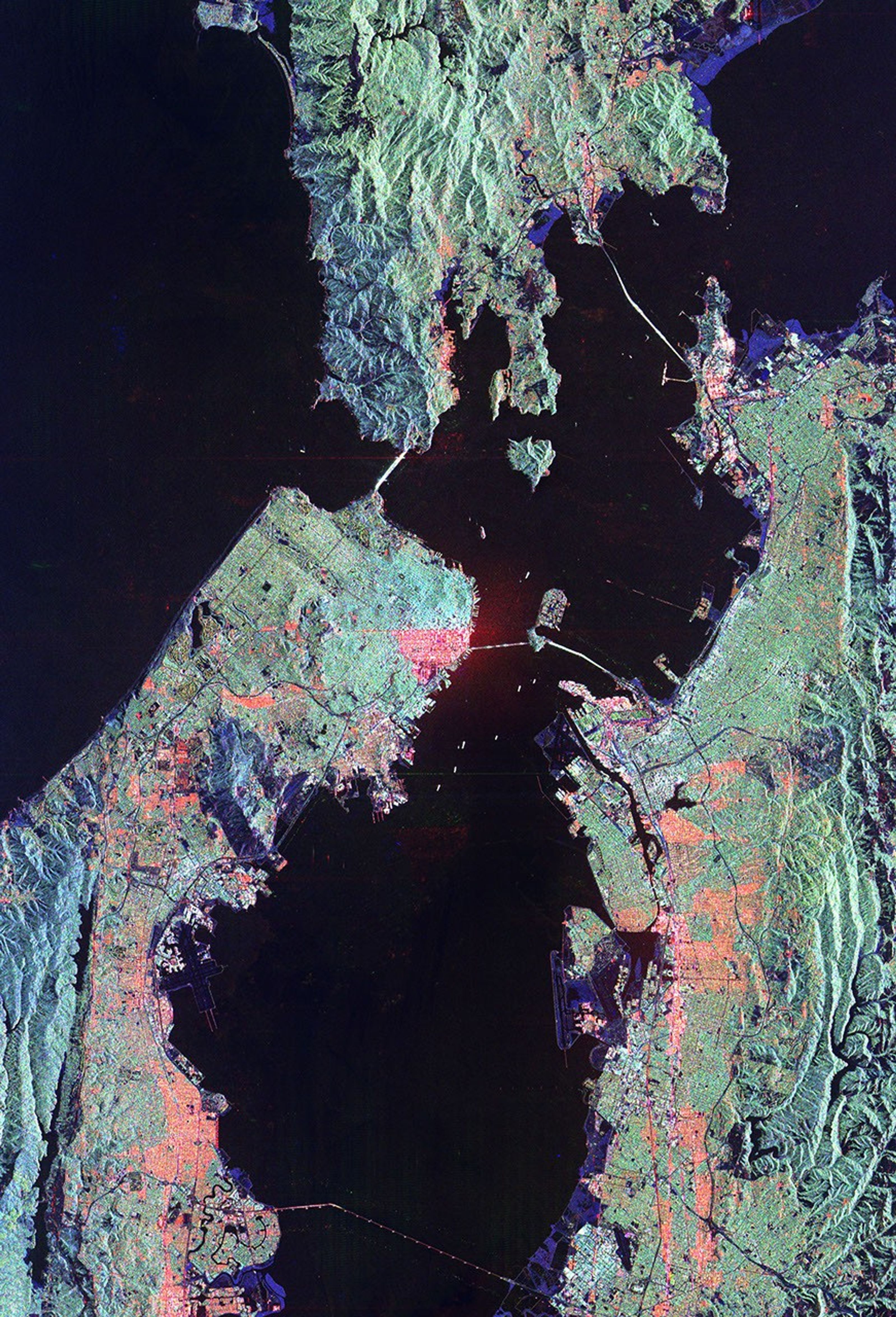 This image from NASA's Spaceborne Imaging Radar-C/X-band Synthetic Aperture Radar of San Francisco, California shows how the radar distinguishes between densely populated urban areas and nearby areas that are relatively unsettled.