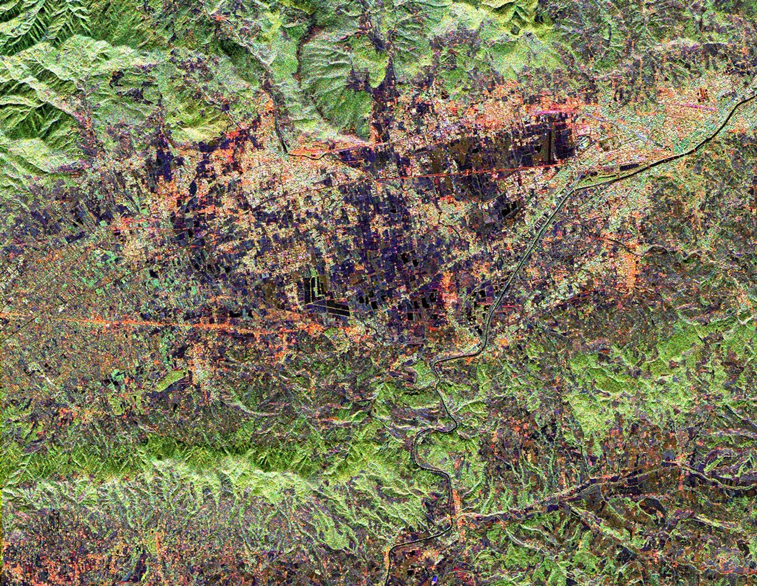 This radar image from NASA's Spaceborne Imaging Radar-C/X-band Synthetic Aperture Radar shows land use patterns in and around the city of Florence, Italy. Florence is situated on a plain in the Chianti Hill region of Central Italy.