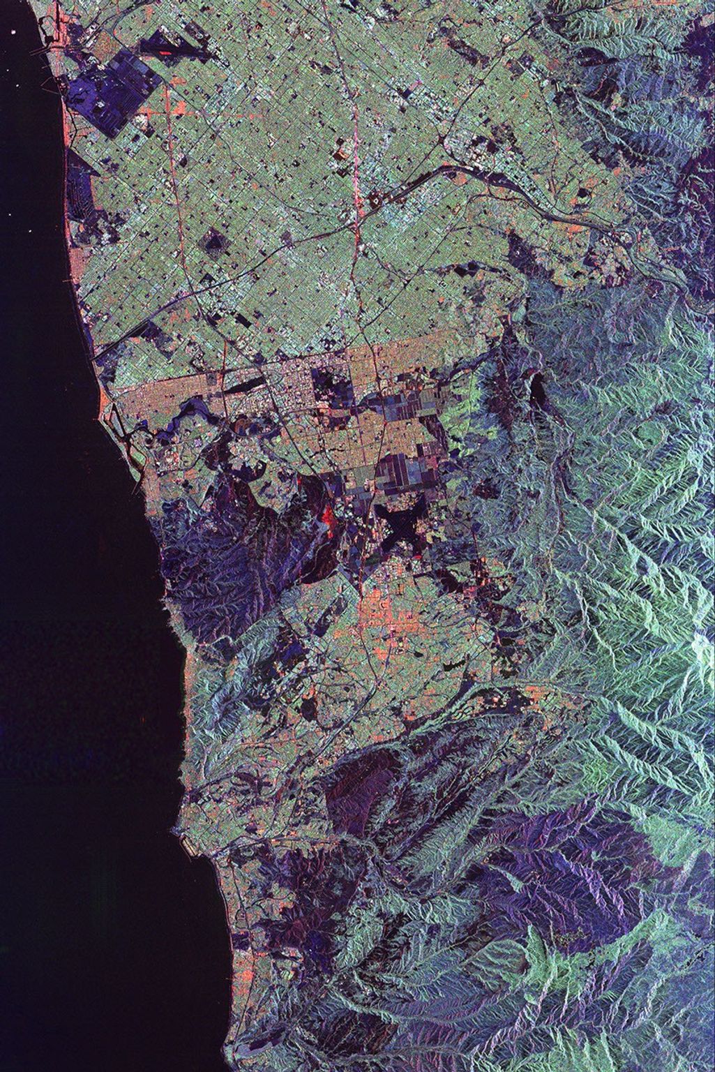 This spaceborne radar image from NASA's Spaceborne Imaging Radar C/X-Band Synthetic Aperture Radar of Orange County, Calif., shows the massive urbanization of this rapidly growing region located just south of Los Angeles.