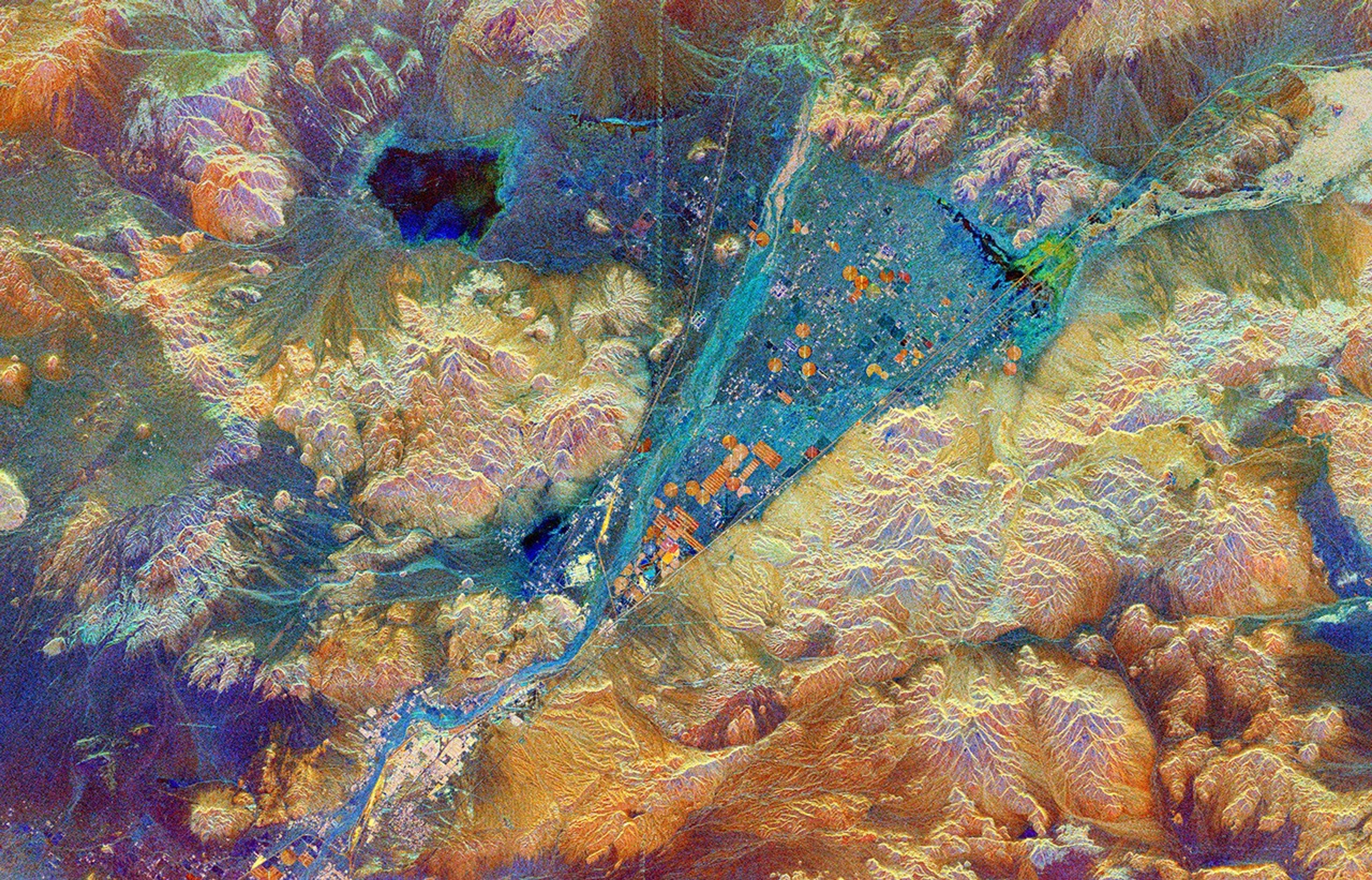 This spaceborne radar image from NASA's Spaceborne Imaging Radar C/X-Band Synthetic Aperture shows part of the Mojave Desert in the vicinity of Barstow, California and revealing human activities in the arid environment of the southern California deserts.