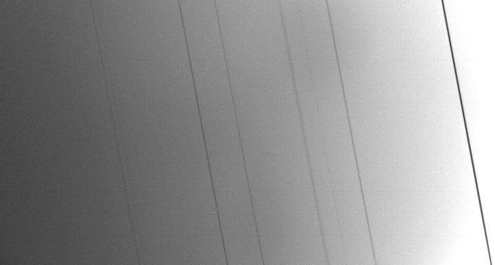 This silhouetted image of the rings of Uranus was taken by NASA's Voyager 2 spacecraft on Jan. 24, 1986, just 27 minutes before its closest approach to the planet.