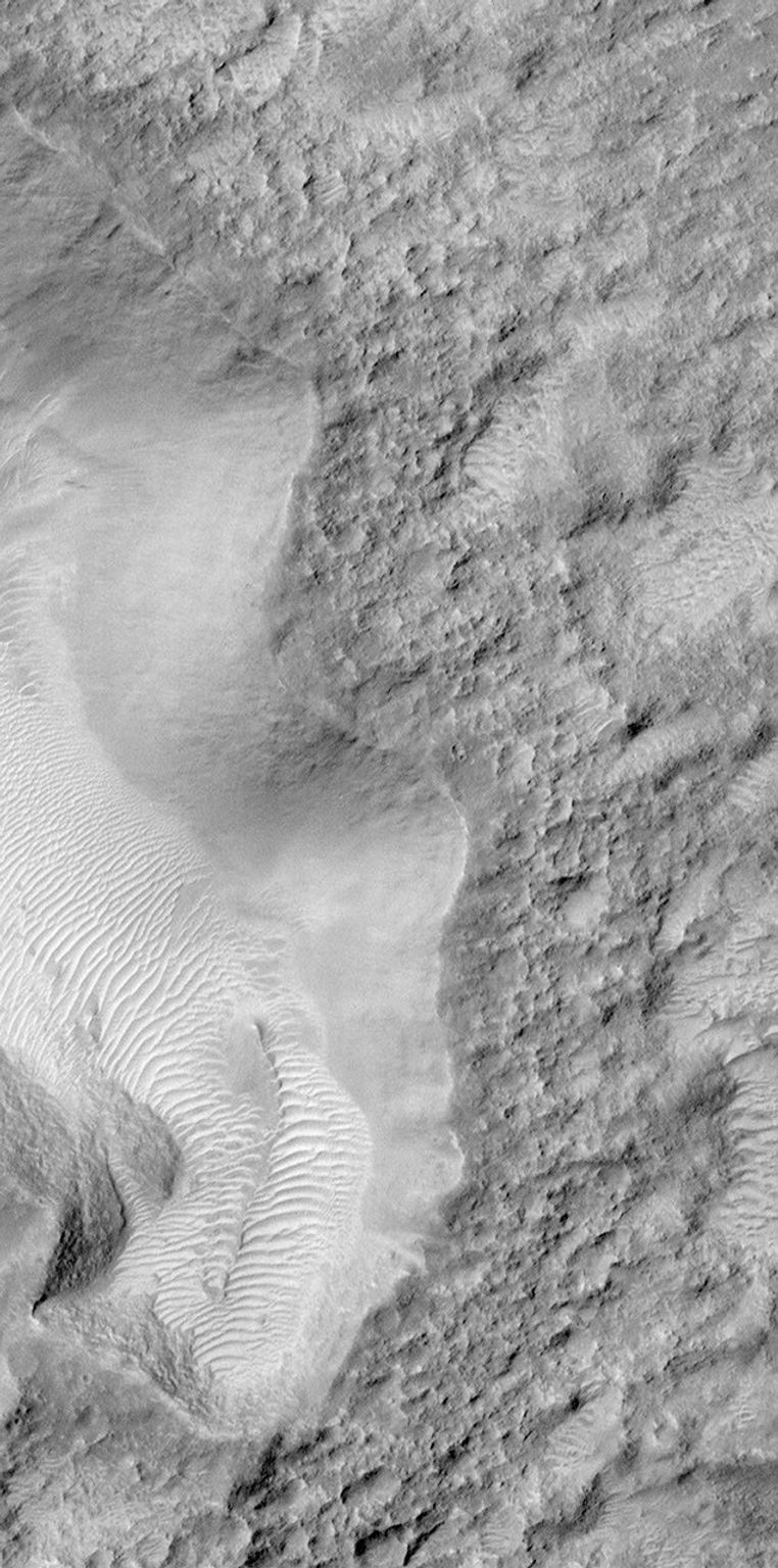 NASA's Viking Orbiter picture, on left, shows the crater, Escalante. The right shows the same area from NASA's Mars Global Surveyor. Both show a crater wall that is relatively smooth.