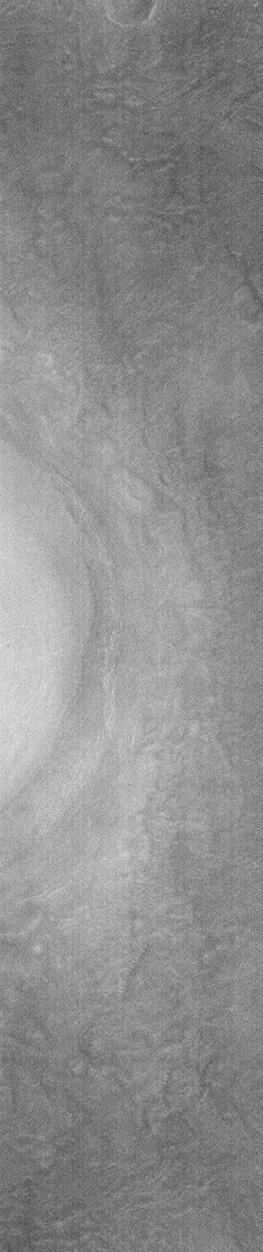 NASA's Mars Global Surveyor shows a group of four small hills surrounded by the larger mountains in the Cydonia region of Mars.