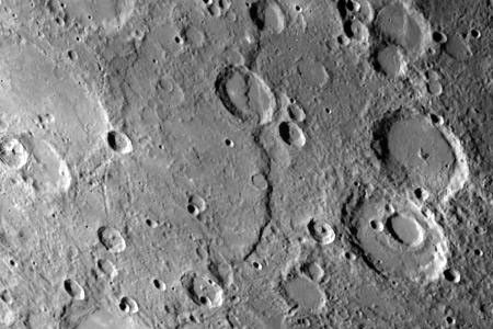 One of the most prominent lobate scarps (Discovery Scarp), photographed by NASA's Mariner 10 during it's first encounter with Mercury, is located at the center of this image (extending from the top to near bottom).