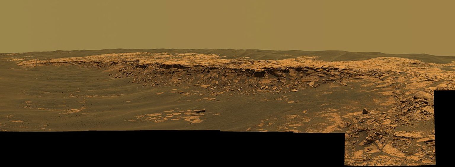 The panoramic camera aboard NASA's Mars Exploration Rover Opportunity acquired this panorama of the 'Payson' outcrop on the western edge of 'Erebus' Crater during Opportunity's sol 744 (Feb. 26, 2006).