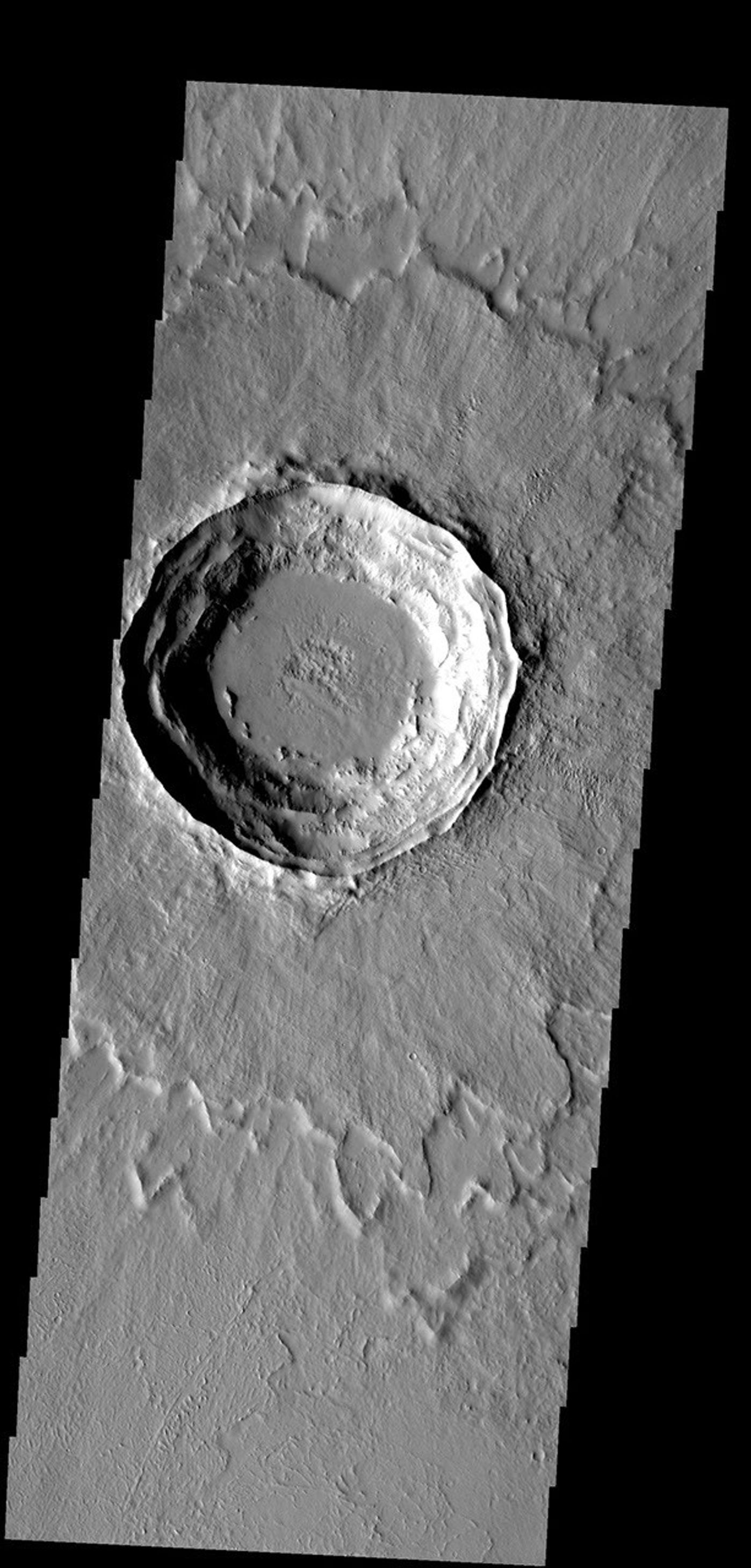 This crater on Mars has a layered ejecta blanket. This image was taken by NASA's 2001 Mars Odyssey.