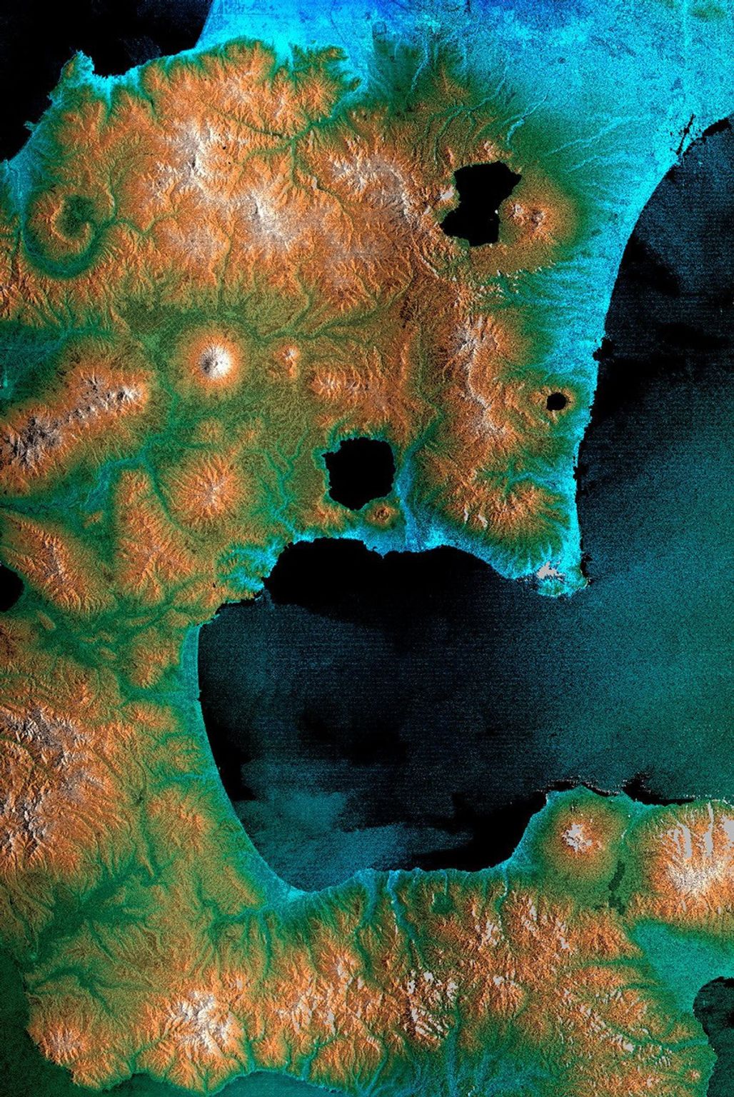 The southeast part of the island of Hokkaido, Japan, is an area dominated by volcanoes and volcanic caldera. The active Usu Volcano is at the lower right edge of the circular Lake Toya-Ko as seen by NASA's Shuttle Radar Topography Mission.