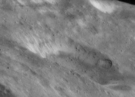 This image of asteroid Eros, taken by NASA's NEAR Shoemaker on May 16, 2000, shows brightness patterns at high spatial resolution. Brighter materials are several percent more reflective than their surroundings.