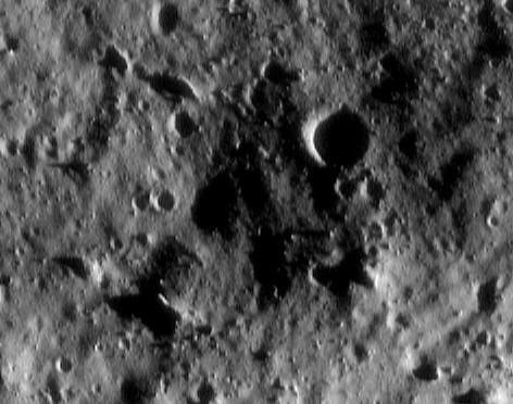 This image of asteroid Eros, taken by NASA's NEAR Shoemaker on July 8, 2000, shows a variety of differently shaped boulders. Some are nearly round, whereas others are elongated or even blade-shaped.