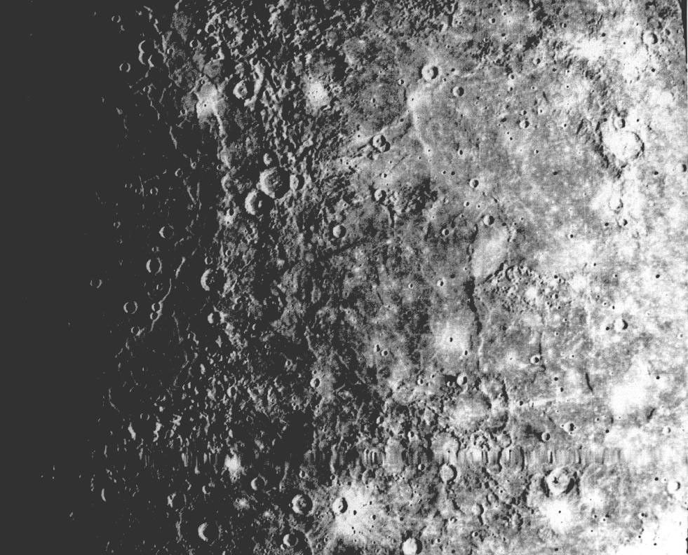 NASA's Mariner 10 shows a close-up view of one-half of a circular basin the largest observed on Mercury. Hills and valleys extend in a radial fashion outward from the main ring.