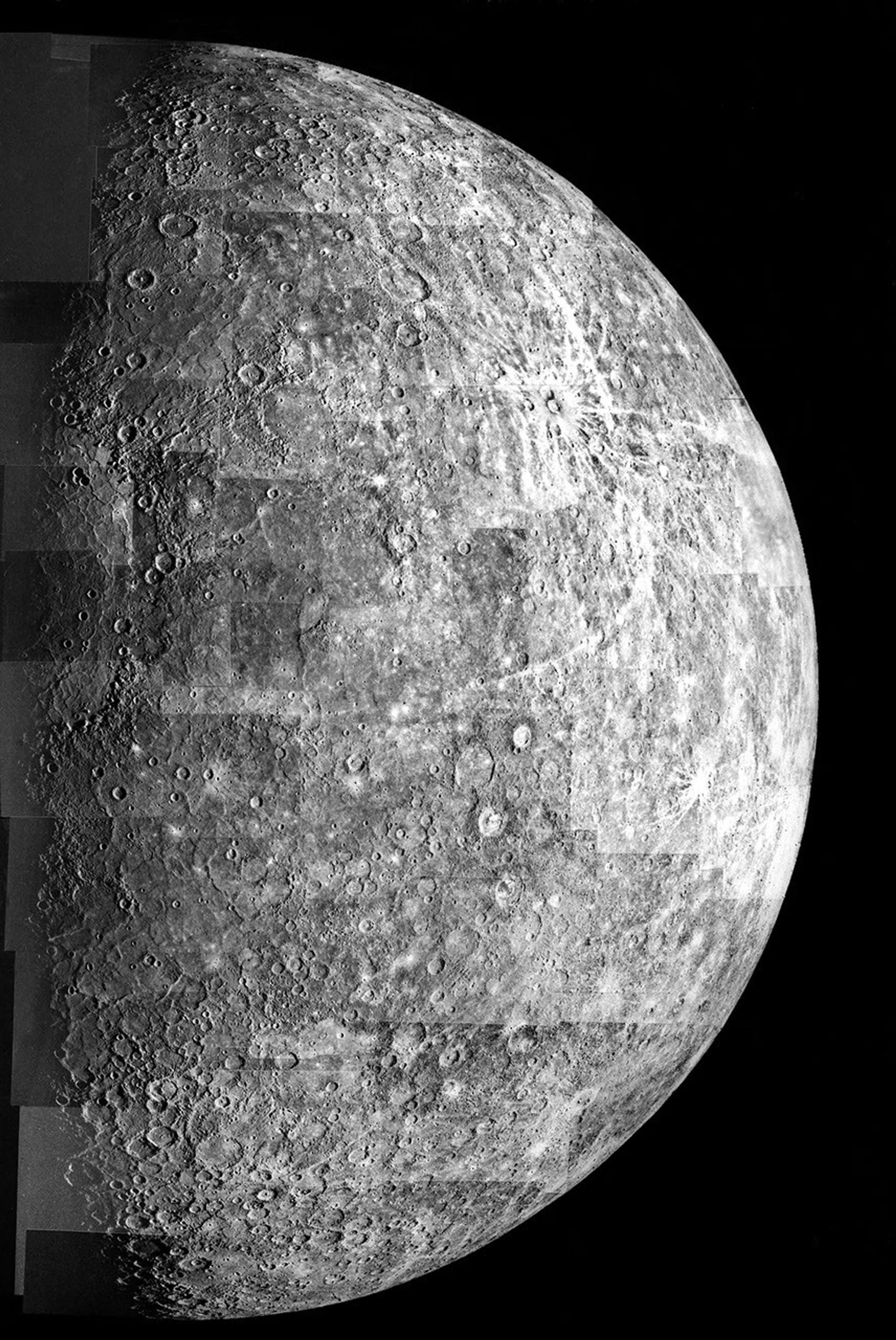 After passing on the darkside of the planet, NASA's Mariner 10 photographed the other, somewhat more illuminated hemisphere of Mercury. The north pole is at the top, two-thirds down from which is the equator.
