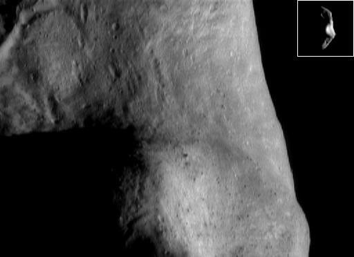 This image of asteroid Eros taken on Nov. 17, 2000, by NASA's NEAR Shoemaker shows the southern hemisphere, at the eastern edge of the saddle region which is covered in boulders and patches of bright surface material.