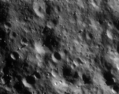 This image of asteroid Eros, taken by NASA's NEAR Shoemaker on Dec. 15, 2000, shows a small cratered region only about 1.1 kilometers (0.7 miles) across.