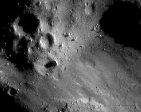 An Eraser Mark on Eros - NASA Science