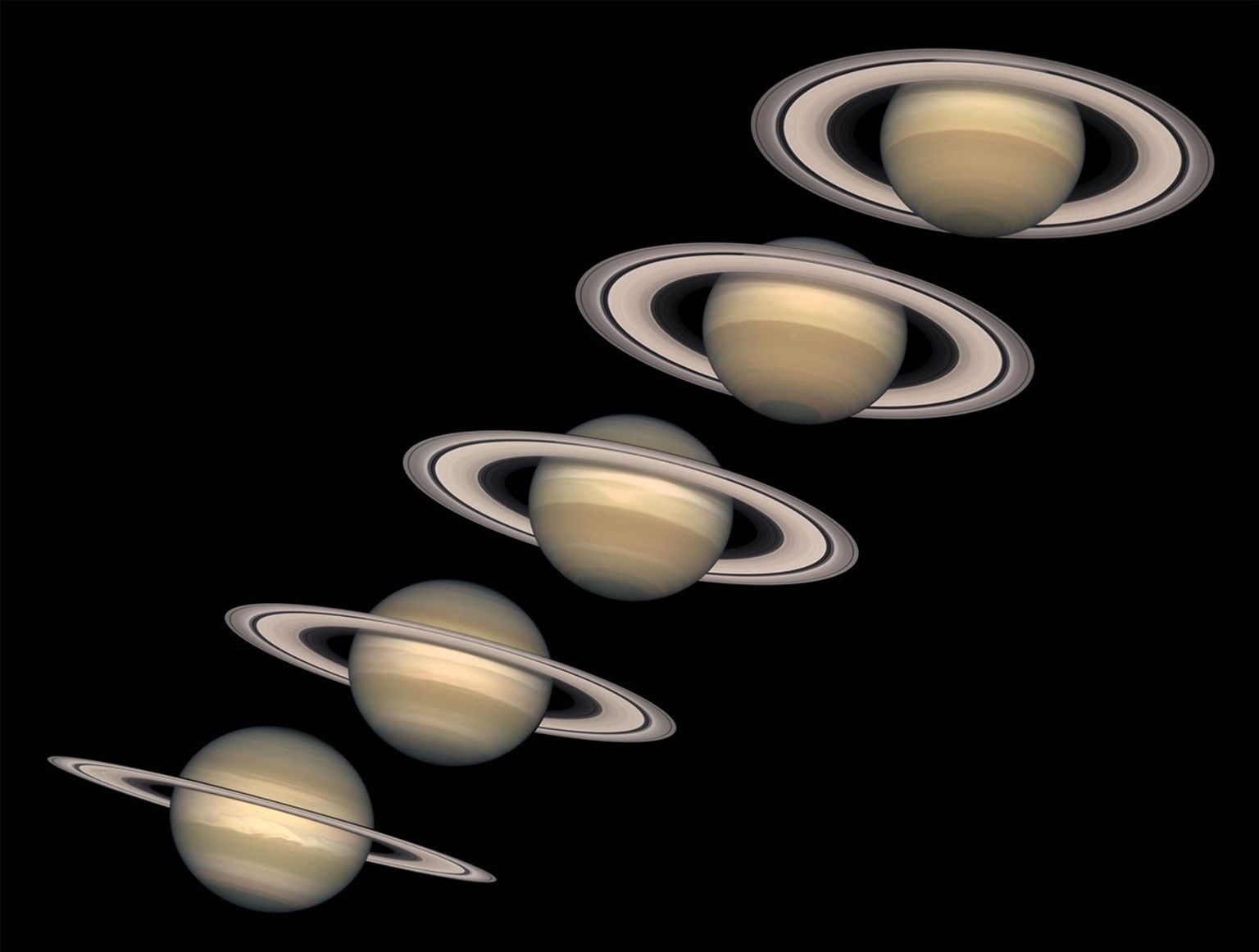 These NASA Hubble Space Telescope images, captured from 1996 to 2000, show Saturn's rings open up from just past edge-on to nearly fully open as it moves from autumn towards winter in its Northern Hemisphere.