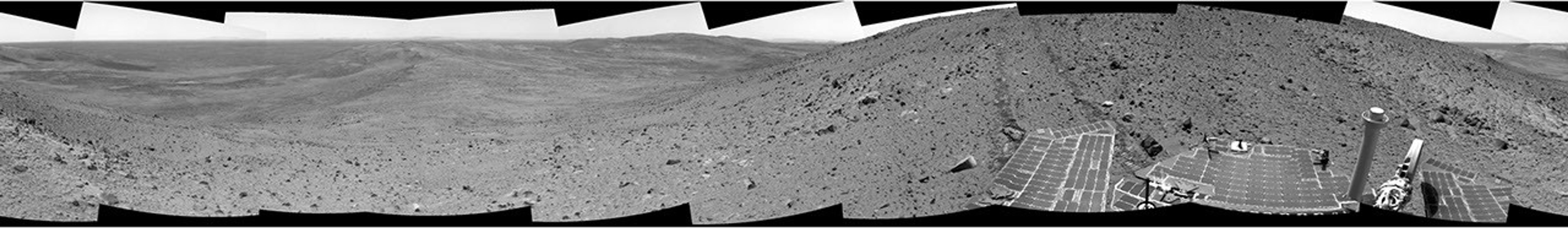 In this image mosaic from NASA's Mars Exploration Rover Spirit taken on Nov 2, 2005, descending due east toward a ridge nicknamed 'Haskin Ridge.' Interesting rocks and soils are present.