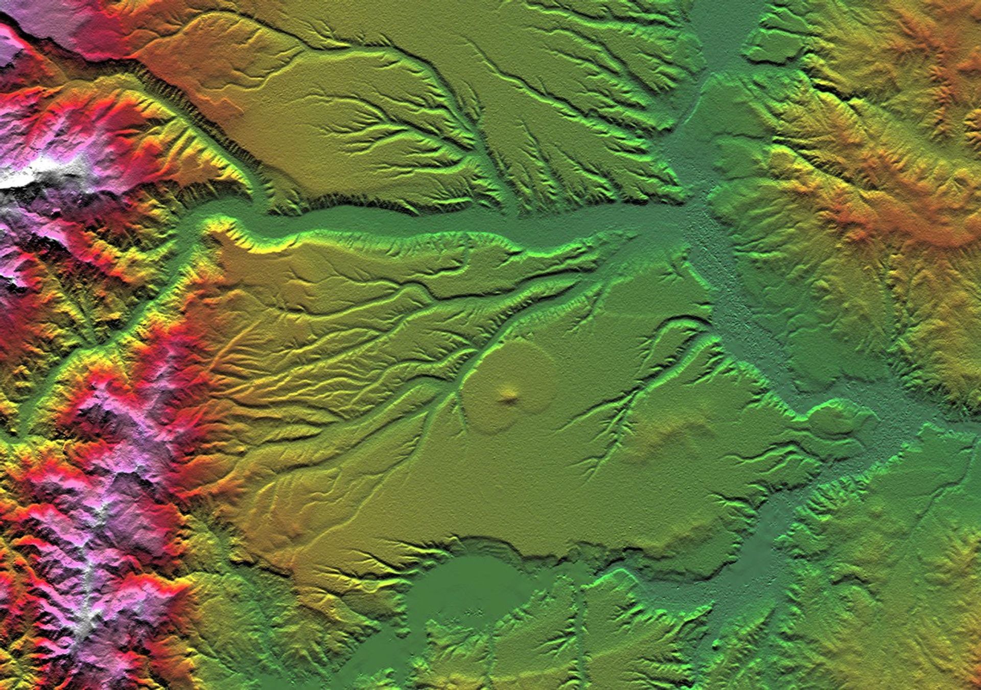 Volcanism and erosion are prominently seen in this view of the eastern flank of the Andes Mountains taken by NASA's Shuttle Radar Topography Mission.